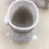 وهي عبارة عن مجموعة صغيرة من الأواني الخزفية الفخارية للخطاولات المكتبية الحديثة ذات الشكل البيضاوي details Picture